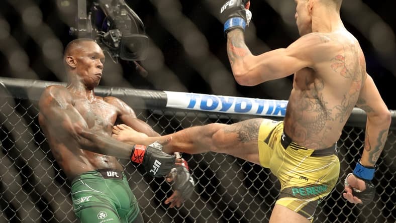 Nov 12, 2022; New York, NY, USA; Israel Adesanya (red gloves) and Alex Pereira (blue gloves) during UFC 281 at Madison Square Garden. Mandatory Credit: Jessica Alcheh-USA TODAY Sports