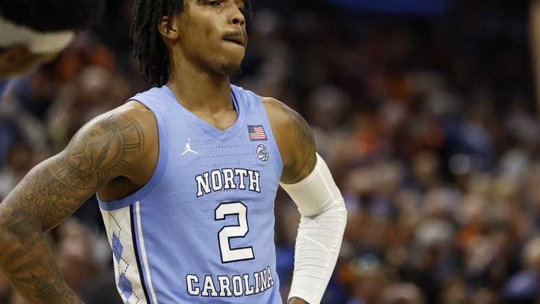 Jan 10, 2023; Charlottesville, Virginia, USA; North Carolina Tar Heels guard Caleb Love (2) reacts against the Virginia Cavaliers during a stoppage in play in the closing seconds in the second half at John Paul Jones Arena. Mandatory Credit: Geoff Burke-USA TODAY Sports