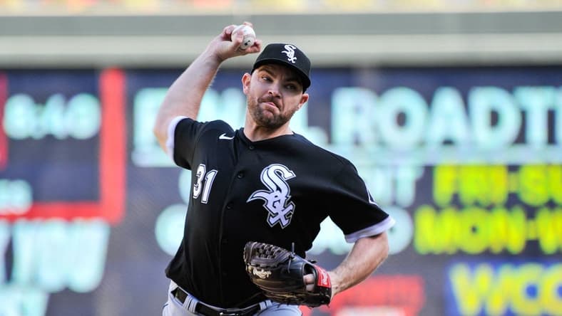 Sep 29, 2022; Minneapolis, Minnesota, USA; Chicago White Sox relief pitcher Liam Hendriks (31) throws a pitch against the Minnesota Twins during the ninth inning at Target Field. Mandatory Credit: Jeffrey Becker-USA TODAY Sports