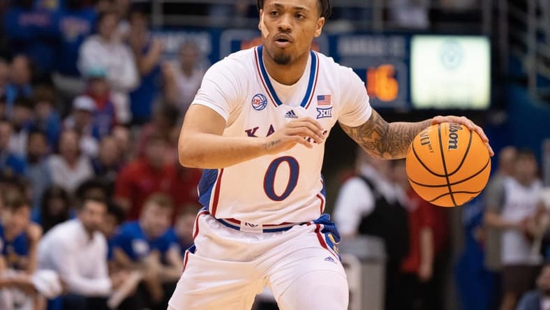 Kansas sophomore guard Bobby Pettiford Jr. (0) looks for an open pass in the first half of Tuesday's Sunflower Showdown against Kansas State inside Allen Fieldhouse.