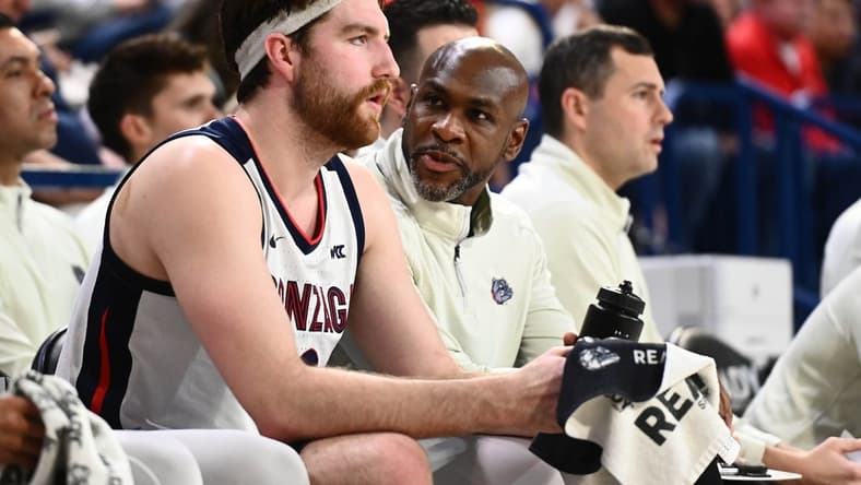 Feb 9, 2023; Spokane, Washington, USA; Gonzaga Bulldogs assistant coach Roger Powell Jr., right, talks with Gonzaga Bulldogs forward Drew Timme (2) during a game against the San Francisco Dons in the second half at McCarthey Athletic Center. Mandatory Credit: James Snook-USA TODAY Sports