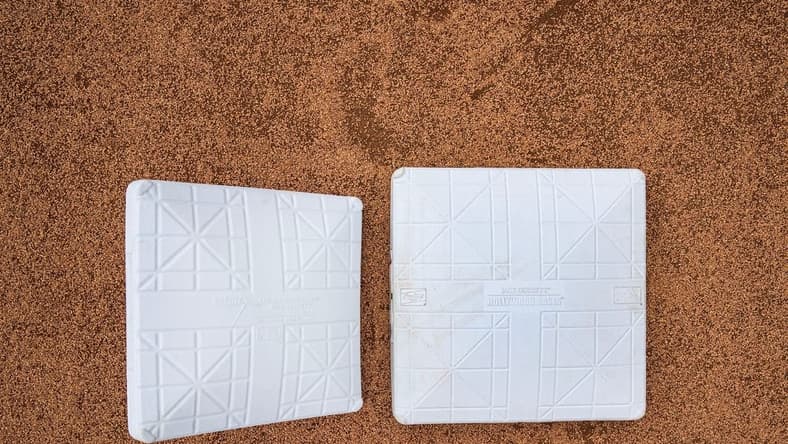 Feb 14, 2023; Scottsdale, AZ, USA; MLB has moved to using a bigger 18  base (right) from the standard 15  base during demonstrations of rules changes for the 2023 MLB season and how they will be implemented for spring training and the regular season at Salt River Fields at Talking Stick. Mandatory Credit: Rob Schumacher-USA TODAY Sports