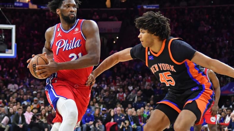 Feb 10, 2023; Philadelphia, Pennsylvania, USA; Philadelphia 76ers center Joel Embiid (21) drives to the basket against New York Knicks center Jericho Sims (45) at Wells Fargo Center. Mandatory Credit: Eric Hartline-USA TODAY Sports