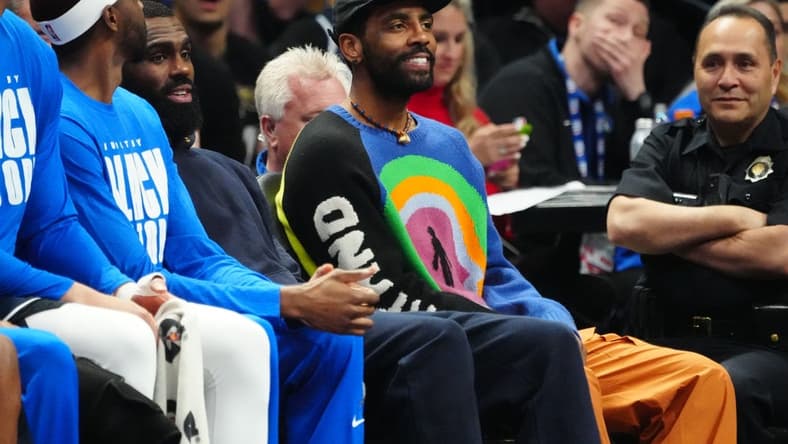 Feb 15, 2023; Denver, Colorado, USA; Dallas Mavericks guard Kyrie Irving (2) on the bench in the second quarter against the Denver Nuggets at Ball Arena. Mandatory Credit: Ron Chenoy-USA TODAY Sports