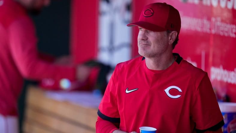 Cincinnati Reds manager David Bell stands by in the dugout during the eighth inning of the MLB Cactus League spring training game between the Cincinnati Reds and the Cleveland Guardians at Goodyear Ballpark in Goodyear, Ariz., on Saturday, Feb. 25, 2023.

Cleveland Guardians At Cincinnati Reds Spring Training