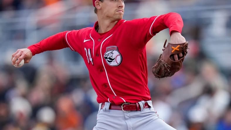 Cincinnati Reds relief pitcher Luke Weaver (34) throws a pitch in the first inning of the MLB Cactus League spring training game between the San Francisco Giants and the Cincinnati Reds at Scottsdale Stadium in Goodyear, Ariz., on Sunday, Feb. 26, 2023. The Giants came back in the ninth inning to win on a walk-off single off the bat of Will Wilson.

Cincinnati Reds At San Francisco Giants Spring Training