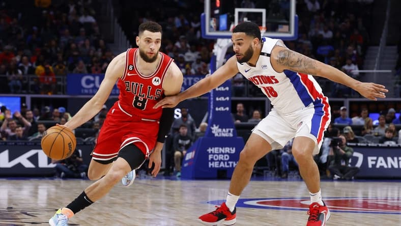 Mar 1, 2023; Detroit, Michigan, USA; Chicago Bulls guard Zach LaVine (8) dribbles on Detroit Pistons guard Cory Joseph (18) in the second half at Little Caesars Arena. Mandatory Credit: Rick Osentoski-USA TODAY Sports