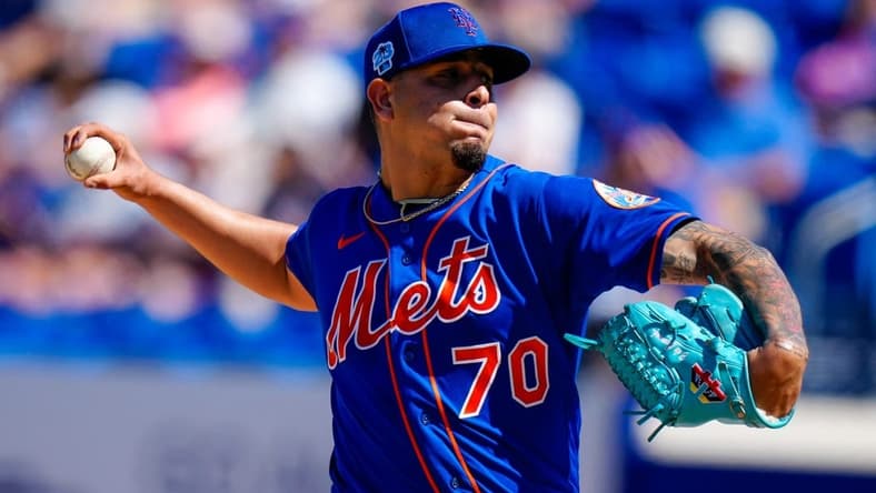 Mar 2, 2023; Port St. Lucie, Florida, USA; New York Mets starting pitcher Jose Butto (70) throws a pitch against the Atlanta Braves during the third inning at Clover Park. Mandatory Credit: Rich Storry-USA TODAY Sports