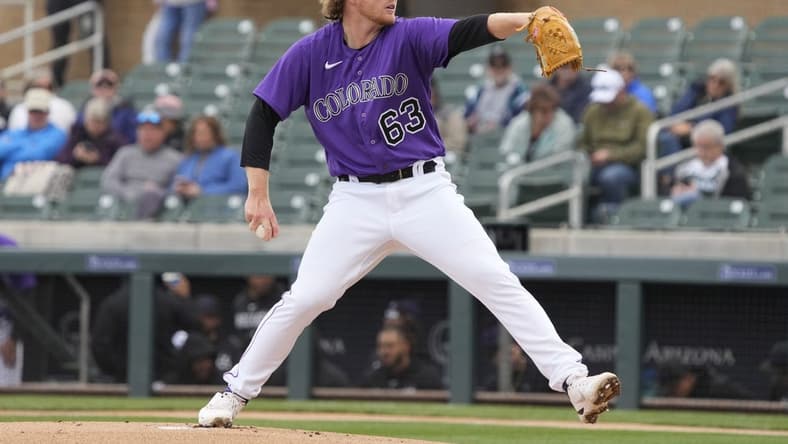 Mar 2, 2023; Salt River Pima-Maricopa, Arizona, USA; Colorado Rockies starting pitcher Noah Davis (63) throws against the Chicago White Sox in the first inning at Salt River Fields at Talking Stick. Mandatory Credit: Rick Scuteri-USA TODAY Sports