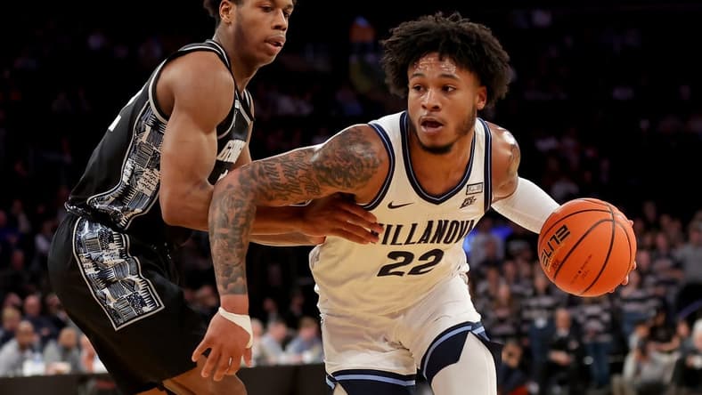 Mar 8, 2023; New York, NY, USA; Villanova Wildcats forward Cam Whitmore (22) drives to the basket against Georgetown Hoyas guard Jordan Riley (12) during the second half at Madison Square Garden. Mandatory Credit: Brad Penner-USA TODAY Sports