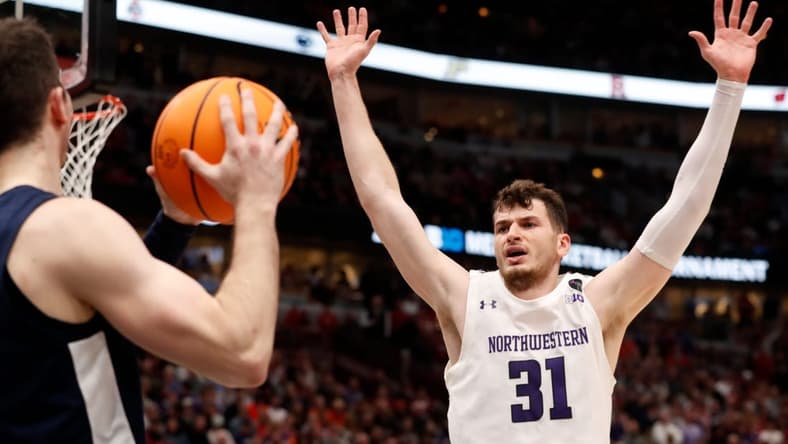 Northwestern Wildcats forward Robbie Beran (31) defends an inbounds pass during the Big Ten Men   s Basketball Tournament game against the Penn State Nittany Lions, Friday, March 10, 2023, at United Center in Chicago. Penn State won 67-65 in overtime.

Norpsu031023 Am16906