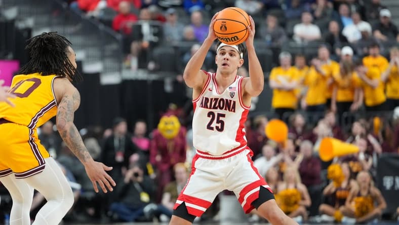 Mar 10, 2023; Las Vegas, NV, USA; Arizona Wildcats guard Kerr Kriisa (25) looks to make a pass against the Arizona State Sun Devils during the second half at T-Mobile Arena. Mandatory Credit: Stephen R. Sylvanie-USA TODAY Sports