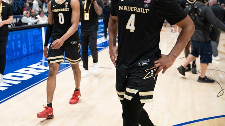 Vanderbilt guard Jordan Wright (4) and guard Tyrin Lawrence (0) walk off the court after losing 87 to 75 against Texas A&M in a semifinal SEC Men   s Basketball Tournament game at Bridgestone Arena Saturday, March 11, 2023, in Nashville, Tenn.

Sec Basketball Vanderbilt Vs Texas A M