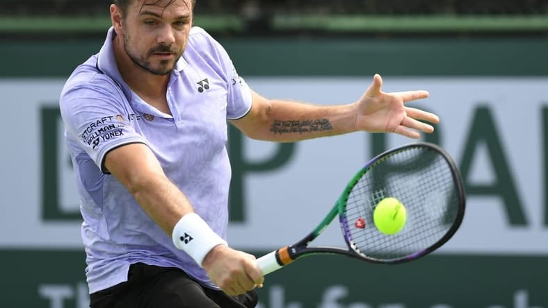 Mar 11, 2023; Indian Wells, CA, USA; Stan Wawrinka (SUI) hits a backhand during his 2nd round match against Miormir Kecmanovic (SRB) (not pictured) during the BNP Paribas Open at Indian Wells Tennis Garden. Mandatory Credit: Jonathan Hui-USA TODAY Sports