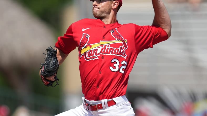 Mar 12, 2023; Jupiter, Florida, USA;  St. Louis Cardinals starting pitcher Steven Matz (32) pitches against the Washington Nationals at Roger Dean Stadium. Mandatory Credit: Jim Rassol-USA TODAY Sports