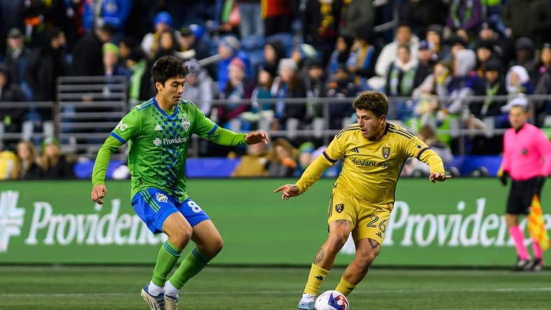 Mar 4, 2023; Seattle, Washington, USA; Real Salt Lake midfielder Diego Luna (26) and Seattle Sounders midfielder Josh Atencio (84) at Lumen Field. Seattle defeated Real Salt Lake 2-0. Mandatory Credit: Steven Bisig-USA TODAY Sports