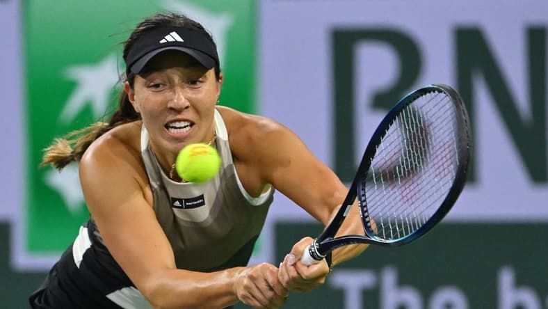 Mar 14, 2023; Indian Wells, CA, USA; Jessica Pegula (USA) hits a shot in her fourth round match against Petra Kvitova (CZE) in the BNP Paribas Open at the Indian Wells Tennis Garden. Mandatory Credit: Jayne Kamin-Oncea-USA TODAY Sports
