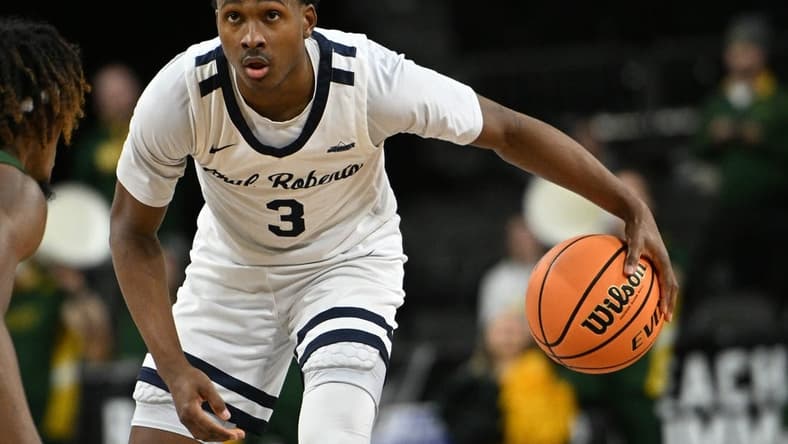 Mar 7, 2023; Sioux Falls, SD, USA;  Oral Roberts Golden Eagles guard Max Abmas (3) dribbles against the North Dakota State Bison in the second half at Denny Sanford Premier Center. Mandatory Credit: Steven Branscombe-USA TODAY Sports