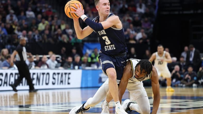 Mar 16, 2023; Sacramento, CA, USA; Utah State Aggies guard Steven Ashworth (3) moves the ball against Missouri Tigers forward Aidan Shaw (23) during the second half at Golden 1 Center. Mandatory Credit: Kelley L Cox-USA TODAY Sports