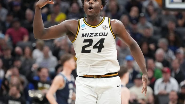 Mar 16, 2023; Sacramento, CA, USA; Missouri Tigers guard Kobe Brown (24) reacts after scoring a basket agianst the Utah State Aggies during the second half at Golden 1 Center. Mandatory Credit: Kyle Terada-USA TODAY Sports