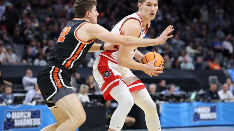 Mar 16, 2023; Sacramento, CA, USA; Arizona Wildcats forward Azuolas Tubelis (10) controls the ball against Princeton Tigers forward Caden Pierce (12) during the first half at Golden 1 Center. Mandatory Credit: Kelley L Cox-USA TODAY Sports