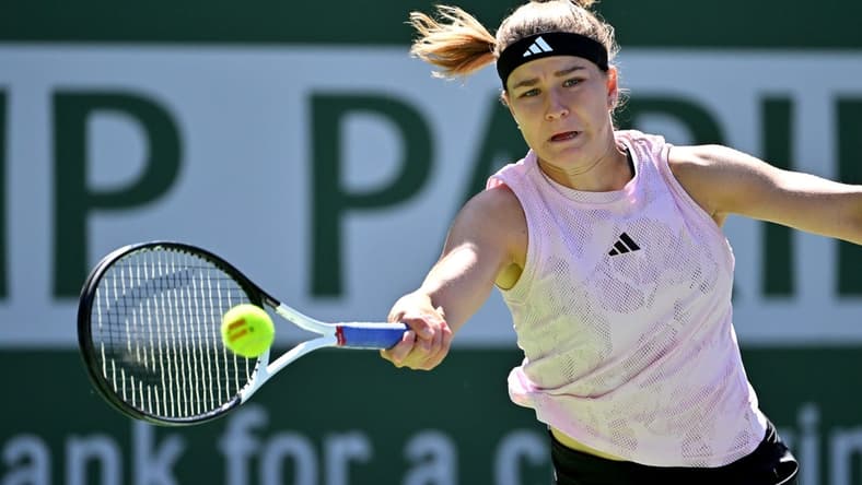 Mar 16, 2023; Indian Wells, CA, USA;  Karolina Muchova (CZE) hits a shot against Elena Rybakina (KAZ) in her quarterfinal match in the BNP Paribas Open at the Indian Wells Tennis Garden. Mandatory Credit: Jayne Kamin-Oncea-USA TODAY Sports