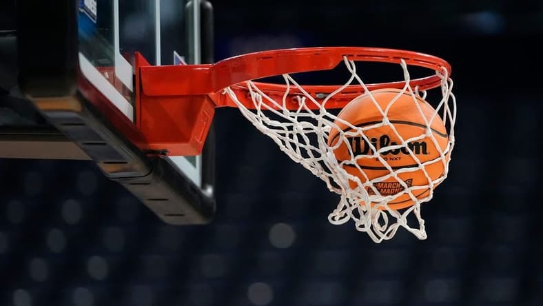 Mar 16, 2023; Columbus, Ohio, USA;  A ball falls through the net during a practice for the NCAA men   s basketball tournament at Nationwide Arena. Mandatory Credit: Adam Cairns-The Columbus Dispatch

Basketball Ncaa Men S Basketball Tournament