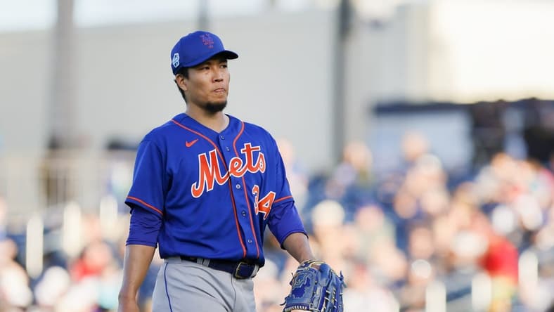 Mar 16, 2023; West Palm Beach, Florida, USA; New York Mets starting pitcher Kodai Senga (34) returns to the dugout after the second inning against the Washington Nationals at The Ballpark of the Palm Beaches. Mandatory Credit: Sam Navarro-USA TODAY Sports