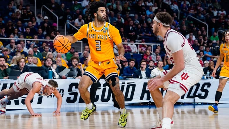 Mar 17, 2023; Albany, NY, USA; Kent State Golden Flashes guard Sincere Carry (3) controls the ball as Indiana Hoosiers forward Race Thompson (25) guards in the second half at MVP Arena. Mandatory Credit: Gregory Fisher-USA TODAY Sports