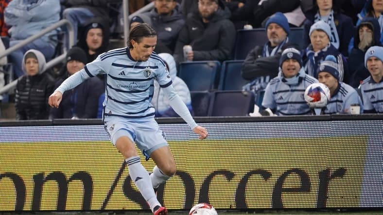 Mar 11, 2023; Kansas City, Kansas, USA;  Sporting Kansas City defender Ben Sweat (2) kicking the ball at Children's Mercy Park. Mandatory Credit: Gary Rohman-USA TODAY Sports