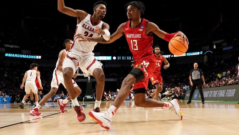 Mar 18, 2023; Birmingham, AL, USA; Maryland Terrapins guard Hakim Hart (13) dribbles against Alabama Crimson Tide forward Brandon Miller (24) during the second half at Legacy Arena. Mandatory Credit: Marvin Gentry-USA TODAY Sports