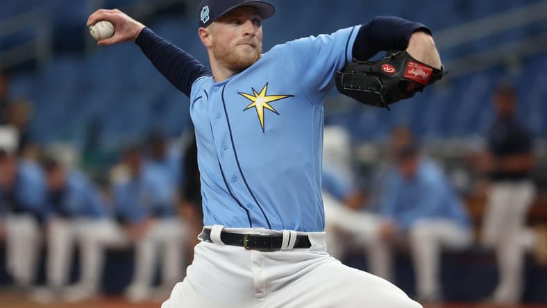 Mar 19, 2023; St. Petersburg, Florida, USA;  Tampa Bay Rays starting pitcher Drew Rasmussen (57) throws a pitch against the Toronto Blue Jays during the second inning at Tropicana Field. Mandatory Credit: Kim Klement-USA TODAY Sports