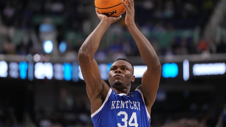 Mar 19, 2023; Greensboro, NC, USA; Kentucky Wildcats forward Oscar Tshiebwe (34) shoots for the basket during the second half against the Kansas State Wildcats in the second round of the 2023 NCAA men s basketball tournament at Greensboro Coliseum. Mandatory Credit: Bob Donnan-USA TODAY Sports