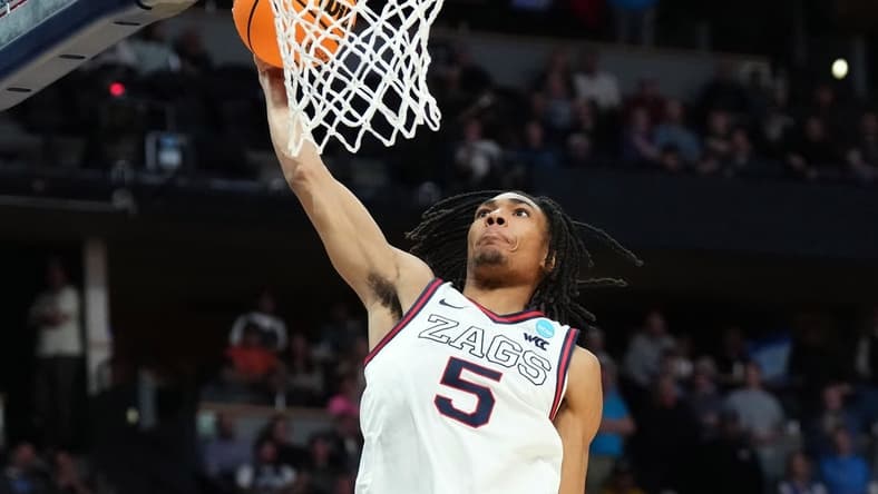 Mar 19, 2023; Denver, CO, USA; Gonzaga Bulldogs guard Hunter Sallis (5) shoots against the TCU Horned Frogs in the second half at Ball Arena. Mandatory Credit: Ron Chenoy-USA TODAY Sports
