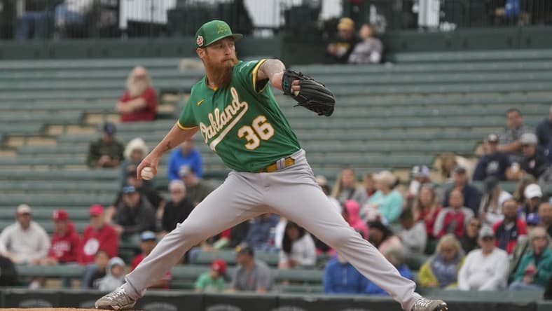 Mar 21, 2023; Tempe, Arizona, USA; Oakland Athletics starting pitcher Adam Oller (36) throws against the Los Angeles Angels in the first inning at Tempe Diablo Stadium. Mandatory Credit: Rick Scuteri-USA TODAY Sports