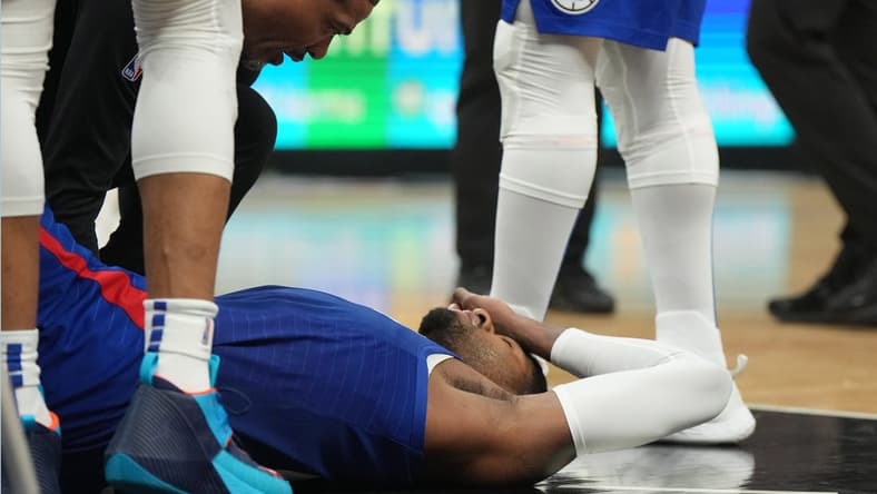 Mar 21, 2023; Los Angeles, California, USA; LA Clippers forward Paul George (13) reacts after suffering an injury against the Oklahoma City Thunder in the second half at Crypto.com Arena. Mandatory Credit: Kirby Lee-USA TODAY Sports