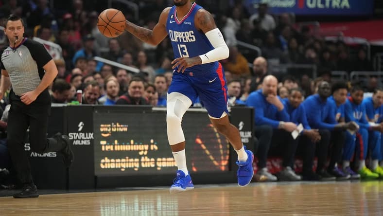 Mar 21, 2023; Los Angeles, California, USA; LA Clippers forward Paul George (13) dribbles the ball against the Oklahoma City Thunder in the first half at Crypto.com Arena. Mandatory Credit: Kirby Lee-USA TODAY Sports