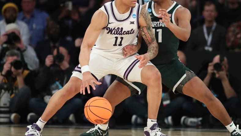 Michigan State guard A.J. Hoggard defends against Kansas State forward Keyontae Johnson during the first half of MSU's 98-93 overtime loss in the Sweet 16 on Thursday, March 23, 2023, in New York.

Msuku 032323 Kd2564