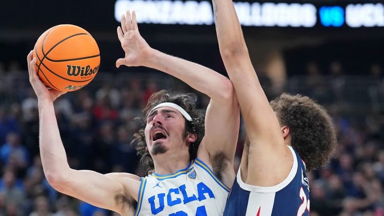 Mar 23, 2023; Las Vegas, NV, USA; UCLA Bruins guard Jaime Jaquez Jr. (24) shoots the ball against Gonzaga Bulldogs forward Anton Watson (22) during the second half at T-Mobile Arena. Mandatory Credit: Joe Camporeale-USA TODAY Sports