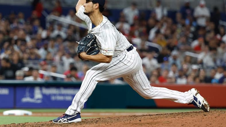 Mar 21, 2023; Miami, Florida, USA; Japan pitcher Yu Darvish (11) pitches against the USA in the eighth inning at LoanDepot Park. Mandatory Credit: Rhona Wise-USA TODAY Sports