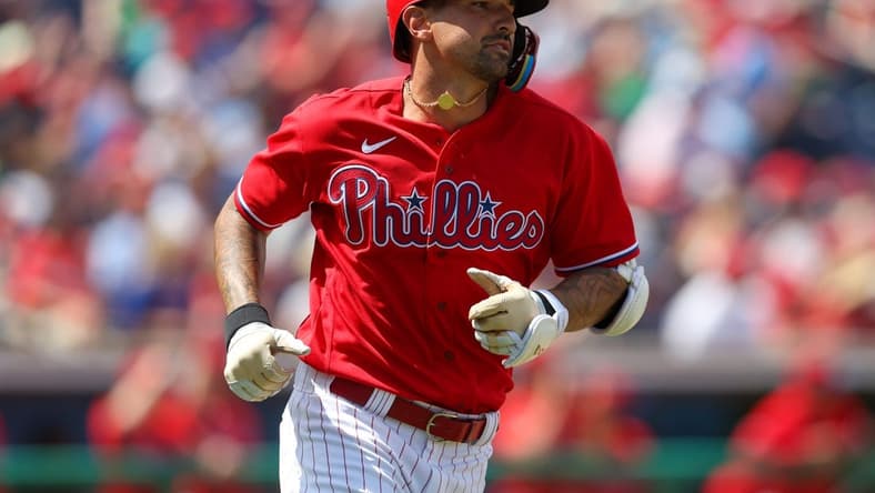Mar 25, 2023; Clearwater, Florida, USA;  Philadelphia Phillies right fielder Nick Castellanos (8) runs the bases after hitting a home run against the New York Yankees in the sixth inning during spring training at BayCare Ballpark. Mandatory Credit: Nathan Ray Seebeck-USA TODAY Sports