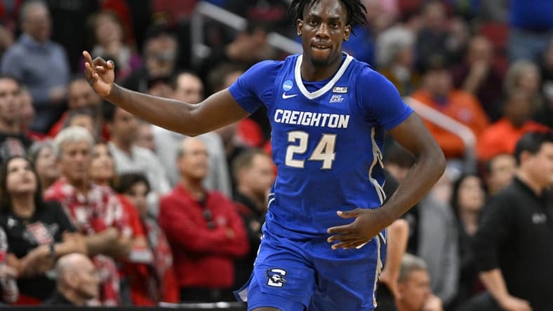 Mar 26, 2023; Louisville, KY, USA;  Creighton Bluejays forward Arthur Kaluma (24) celebrates scoring a basket during the second half against the San Diego State Aztecs at the NCAA Tournament South Regional-Creighton vs San Diego State at KFC YUM! Center.  Mandatory Credit: Jamie Rhodes-USA TODAY Sports