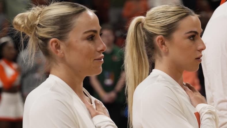 Mar 26, 2023; Greenville, SC, USA; Miami Hurricanes guard Haley Cavinder (14) and guard Hanna Cavinder (15) during the NCAA Women s Tournament against the LSU Lady Tigers  at Bon Secours Wellness Arena. Mandatory Credit: Jim Dedmon-USA TODAY Sports