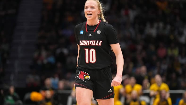 Mar 26, 2023; Seattle, WA, USA; Louisville Cardinals guard Hailey Van Lith (10) reacts against the Iowa Hawkeyes in the first half at Climate Pledge Arena. Mandatory Credit: Kirby Lee-USA TODAY Sports