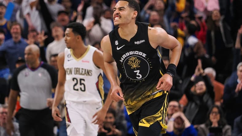 Mar 28, 2023; San Francisco, California, USA; Golden State Warriors guard Jordan Poole (3) celebrates after scoring a basket against the New Orleans Pelicans during the fourth quarter at Chase Center. Mandatory Credit: Kelley L Cox-USA TODAY Sports