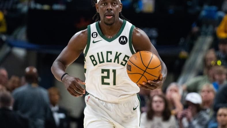 Mar 29, 2023; Indianapolis, Indiana, USA; Milwaukee Bucks guard Jrue Holiday (21) dribbles the ball in the first quarter against the Indiana Pacers at Gainbridge Fieldhouse. Mandatory Credit: Trevor Ruszkowski-USA TODAY Sports