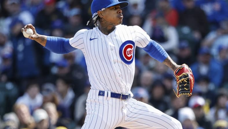 Mar 30, 2023; Chicago, Illinois, USA; Chicago Cubs starting pitcher Marcus Stroman (0) delivers against the Milwaukee Brewers during the first inning at Wrigley Field. Mandatory Credit: Kamil Krzaczynski-USA TODAY Sports