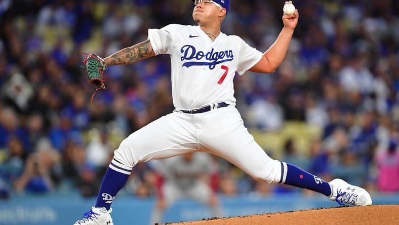 Mar 30, 2023; Los Angeles, California, USA; Los Angeles Dodgers starting pitcher Julio Urias (7) throws against the Arizona Diamondbacks during the first inning at Dodger Stadium. Mandatory Credit: Gary A. Vasquez-USA TODAY Sports