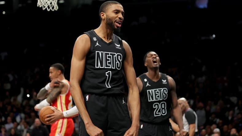Mar 31, 2023; Brooklyn, New York, USA; Brooklyn Nets forward Mikal Bridges (1) reacts after a basket against the Atlanta Hawks during the fourth quarter at Barclays Center. Mandatory Credit: Brad Penner-USA TODAY Sports