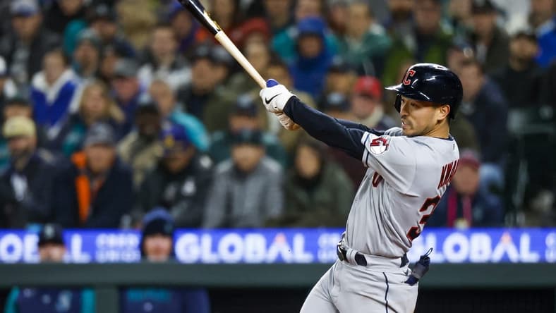 Mar 31, 2023; Seattle, Washington, USA; Cleveland Guardians left fielder Steven Kwan (38) hits a two-run single against the Seattle Mariners during the fifth inning at T-Mobile Park. Mandatory Credit: Joe Nicholson-USA TODAY Sports